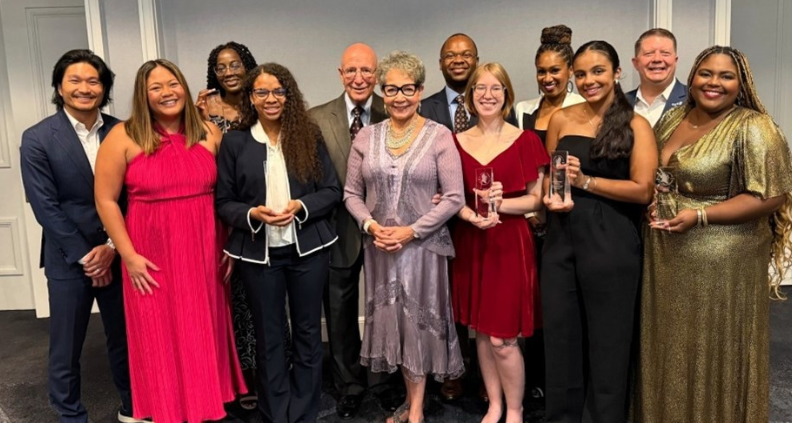 winners of the 2025 dr poston leadership award posing with their trophies