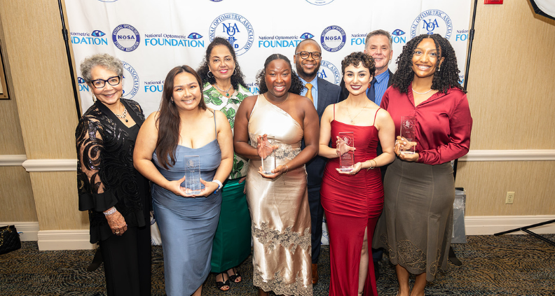 recipients of the 2026 Dr. Poston Leadership Award holding their trophies and posing with VSP board members 