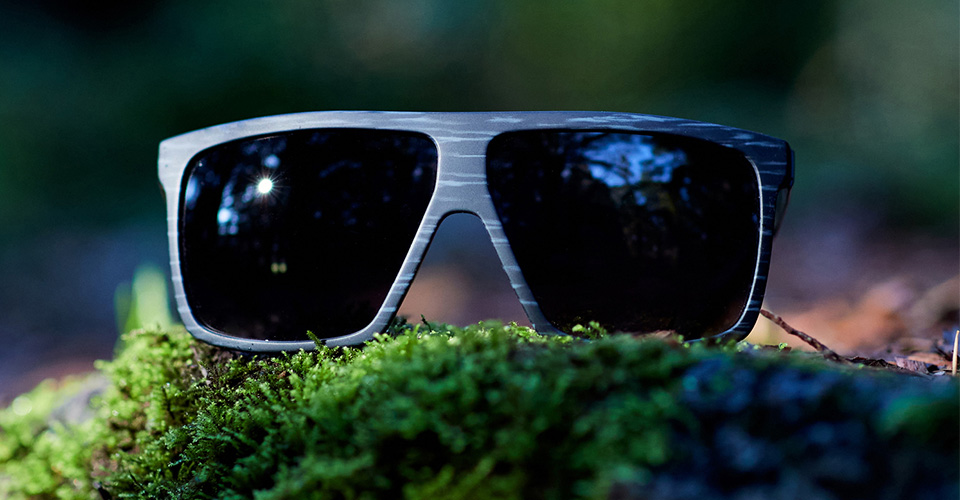 Sunglasses on moss outdoors
