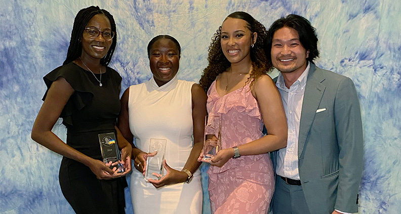 VSP Vision Director of Doctor Relations Quy Nguyen, OD, (right) with scholarship recipients at the National Optometric Association 2024 Conference.