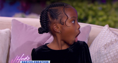 Tatum Galbreth, a little Black girl with braids and wearing a black satin top, is a child motivator and has appeared on The Jennifer Hudson Show.